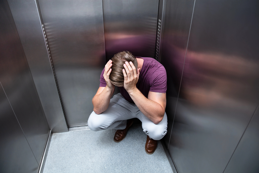 stuck in an elevator - deposit photos